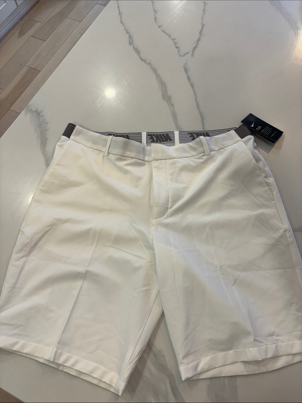 Nike Men’s White Flat-Front Golf Shorts